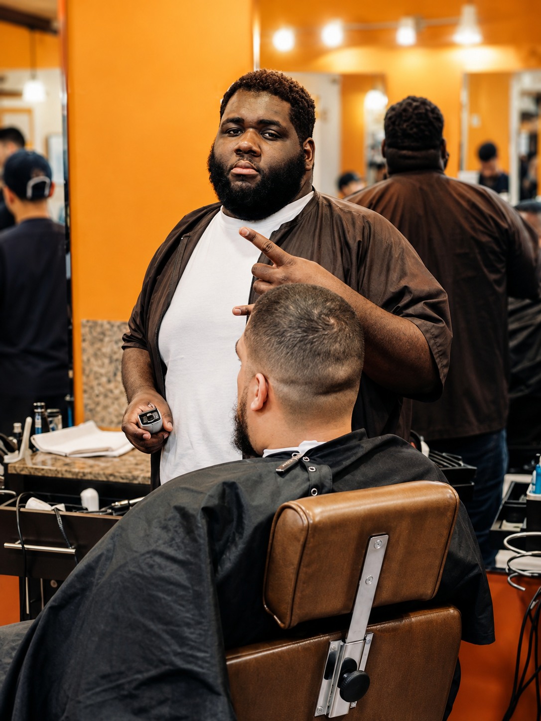 Professional barber focused on his craft